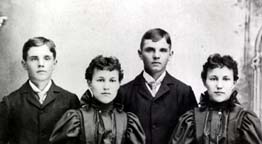 The Dondanville twins, Vinnie (l) and Vernie, sons of Louis and Janette, and Ellie and Nellie (r) daughters of Dan and Mary Ellen, Sandwich, Illinois, circa 1890-95.