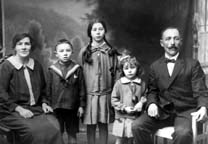 Odile and her husband Emile Dontenville, with their children  Auguste (243.2), Alphonsine (243.1), and  Ernestine (243.3) , St. Maurice, 1928,  prior to the birth of Ernest (243.4).